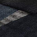 Shower Sauna Space With Colorful Patched Carpet White Black Dark Gray Blue Textured Details