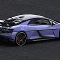 Purple Sports Car With Black Roof Large Rear Spoiler Black Wheels And Red Brake Calipers