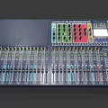 Household Audio Mixer Device Featuring Multiple Faders Knobs And Colorful Panels