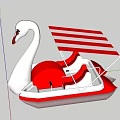Swan Shaped Paddle Boat With Red White Striped Canopy On Water