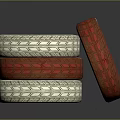 Stylish Stacked Red And White Tires With Intricate Tread Patterns On Dark Background
