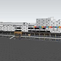 Modern Commercial Complex Shopping Mall Exterior With Glass Facade And Pedestrian Area