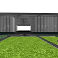 Industrial Factory Building Exterior With Lush Trees Green Lawn People Strolling And Bicycles