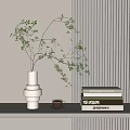 White Stacked Vase With Green Branches And Foliage Near Books And Coffee Cup