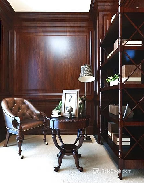 Brown Leather Armchair Featuring Small Round Table Picture Frame Table Lamp And Dark Wooden Wall 3d model 