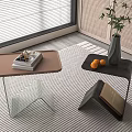 Modern Side Tables Brown Black Tops Glass Legs Books Vase Plant Oranges On Striped Rug