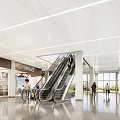 Modern Shopping Mall Lobby With Escalator Brand Stores Perforated Ceiling And People Walking