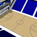 Indoor Basketball Court With Wooden Floor Blue Seats And Home Of The Tigers