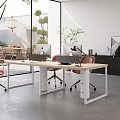 Open Public Office Space With Large Windows Red Chairs Green Plants And Outdoor Courtyard