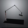 Modern Desk Lamp With White Long Arm Black Base Red Accents And Black Clamp