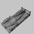Silver Prototype Racing Car With Streamlined Body Rear Wing And Sporty Design