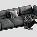 Gray Multi Seater Sofa With Throw Blanket Round Coffee Table And Large Green Plant