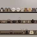 Assorted Tea Utensils Display on Wooden Shelf with Teapots Teacups and Canisters