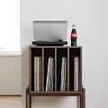 Wooden Side Cabinet with Open Shelves Storing Vinyl Records Laptop and Coca-Cola Bottle on Top