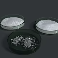 Petri Dishes Containing White Powder and Crystal Samples in Lab Environment