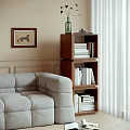 Living Room Decorative Cabinet With Green Bottle Framed Painting Books And Sofa