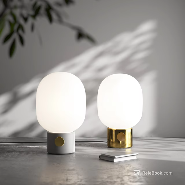White Globe Table Lamps With Grey And Gold Bases On Grey Desk With Small Book 3d model 