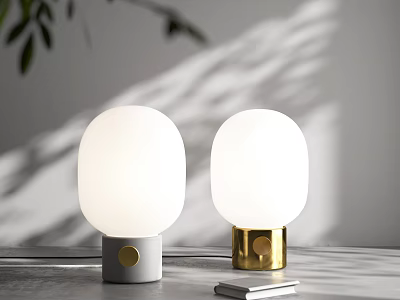 White Globe Table Lamps With Grey And Gold Bases On Grey Desk With Small Book 3d model