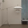 Modern Silver Floor Lamp With White Lampshade In Room With Wooden Floor And Blinds