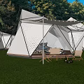 Modern Geometric Outdoor Tent In Grass Field With String Lights And Wooden Furniture