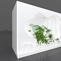 Photo Corner With White Curved Display Structure And Green Plants