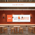 Cozy Restaurant Interior With Orange Wall Wooden Tables Chairs Hanging Lights And Billboard