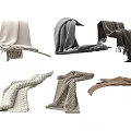 Various Soft Knitted Blankets In Neutral Tones With Fringed Edges For Home Decor