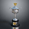 Silver Trophy Featuring Golden Top Decoration And Black Base With Golden Emblem