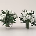 Two Transparent Vases with White Roses and Green Leaves Floral Arrangement