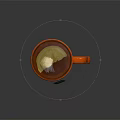 Orange Ceramic Mug With Camellia Tea Bag Steeping In Hot Water