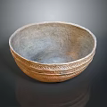 Traditional Handcrafted Clay Bowl With Intricate Carved Patterns And Textured Surface
