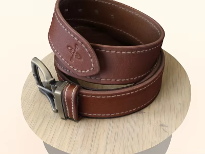 Brown Leather Belt With Stitching And Metal Buckle On Wooden Surface 3d model
