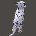 Cute Dalmatian Puppy With Black Spots And Tongue Out Looking Playful