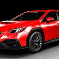 Red Sporty Subaru Sedan With Black Wheels And Sharp Front Design