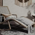 Woven Wooden Lounge Chair with Cushion and Blanket Near Macramé Wall Hanging and Potted Plant