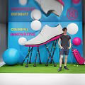 Colorful Innovative Photo Spot With Large White Shoe Golf Balls Clubs Pink Bag Green Grass