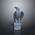 Gray Stone Eagle Statue Perched On Detailed Pedestal Against Dark Background