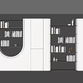 Modern White And Black Built in Bookcase With Circular Opening Holding Books And Decorative Items