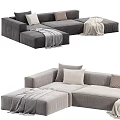 Gray And White Sectional Sofa With Pillows And Blankets For Modern Living Room