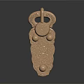 Golden Ornate Jewelry Pendant With Intricate Carvings Circular Hook And Traditional Decorative Patterns