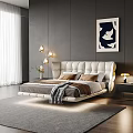 Modern White Double Bed With Upholstered Headboard Brown Pillows Grey Blanket Nightstand And Table Lamp