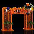 Event Archway with Orange Frame Decorated by Colorful Flowers and Green Plants