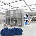 Modern Clothing Store Interior With Display Racks Never Dream Alone Wall Art And Cozy Seating