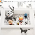 Abstract Silver Sculpture with Colorful Spheres and Black Cat in White Square Corrugated Metal Container