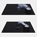 Modern Black Kitchen Cooktop With Control Knobs And Smoking Cooking Pot