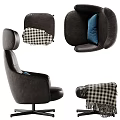 Black Leather Office Chair With Modern Design Navy Blue Pillow And Checkered Blanket