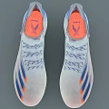Modern White Soccer Shoes With Blue And Orange Stripes And Transparent Studs