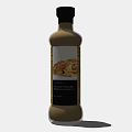 Two Brown Condiment Bottles With Pancake Images On Labels For Kitchen Use