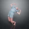 Child Performing Dance Move In Blue Denim Romper Barefoot On Gray Background