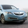 Light Blue Acura Sedan On Road With Mountain View